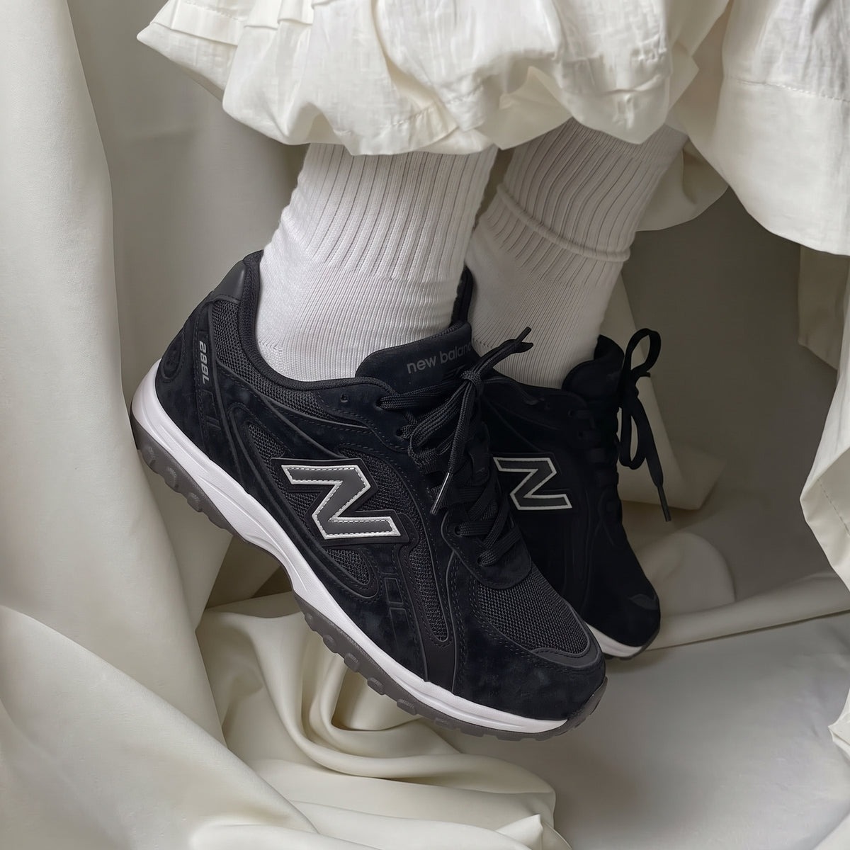 New Balance 208L Noir (Femme)